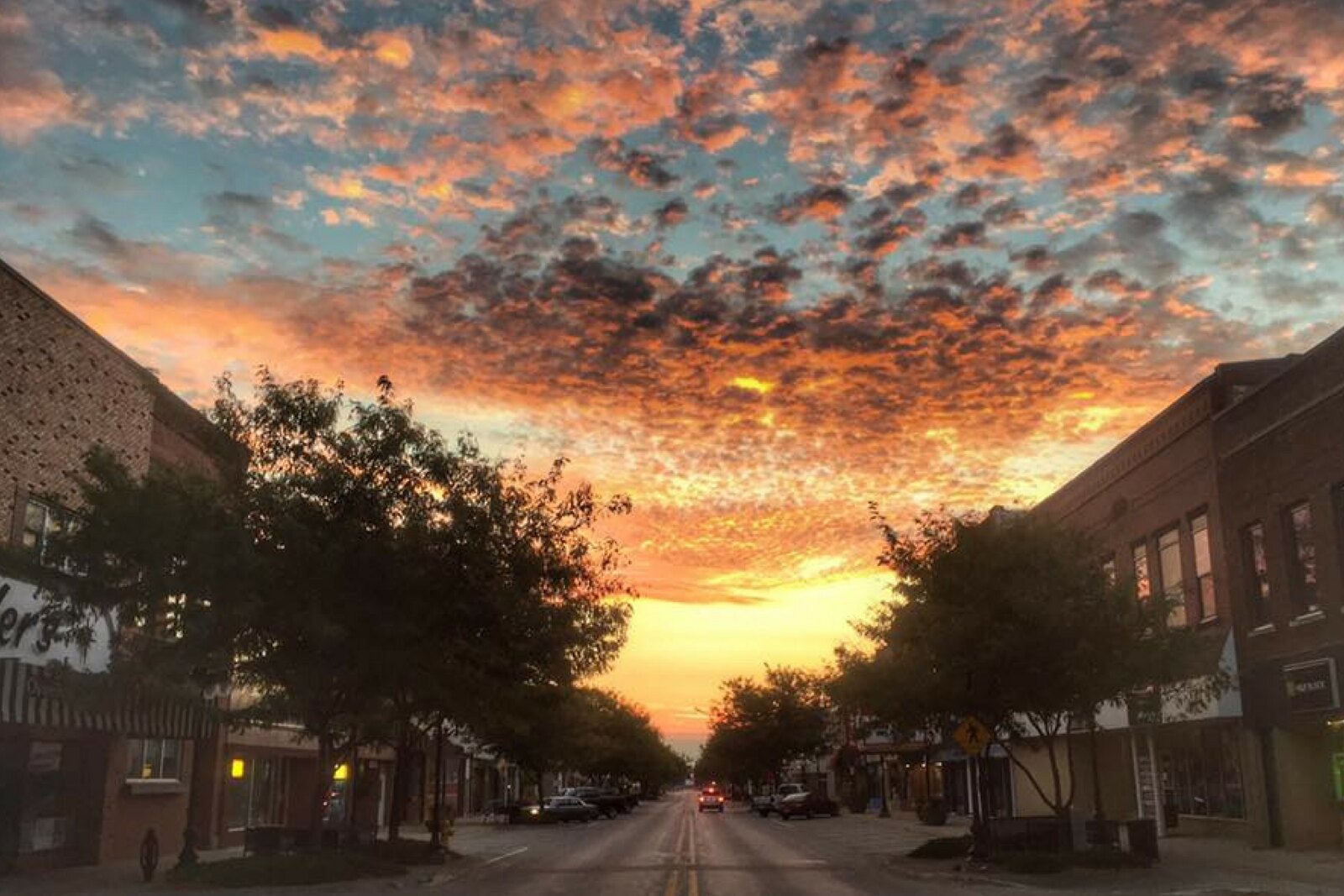 downtown webster city at sunset